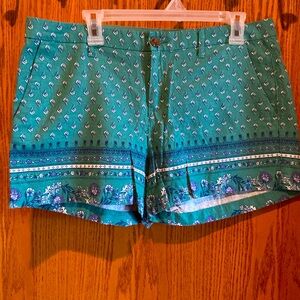 Old Navy shorts, size 12, green with floral pattern.